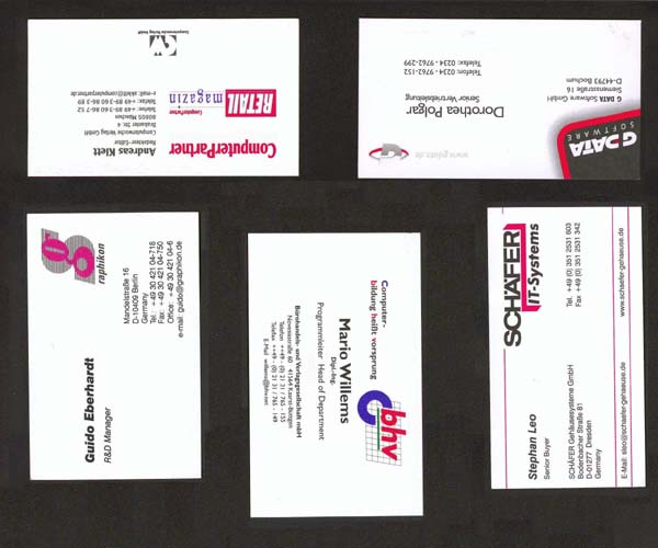 Segmentation of several business card images on a black background